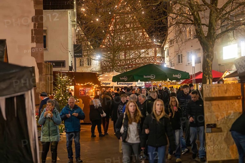 Lively Christmas market with numerous visitors and illuminated half-timbered houses, Christmas market 2025, Nagold, Black Forest, Calw district, Germany