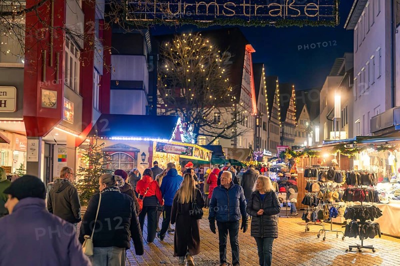 Operated Christmas market at night with festive street lighting, Christmas market 2025, Nagold, Black Forest, Calw district, Germany