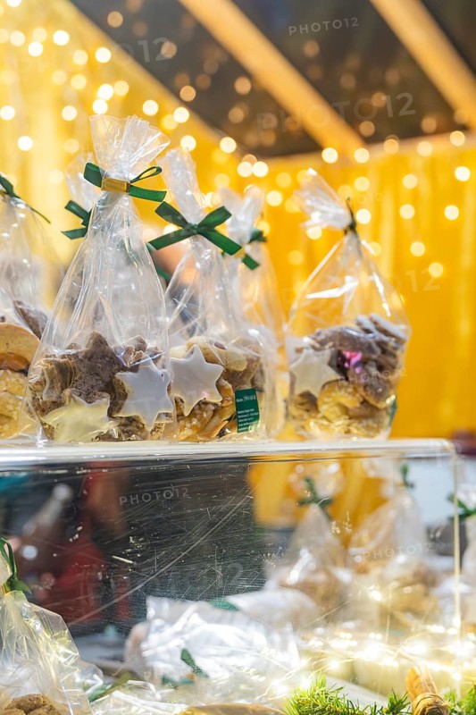 Christmas cookies in transparent packaging, illuminated by festive light at a market, Christmas market 2025, Nagold, Black Forest, Calw district, Germany