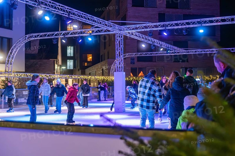 People skating on an illuminated area surrounded by a winter atmosphere, Christmas market 2025, Nagold, Black Forest, Calw district, Germany