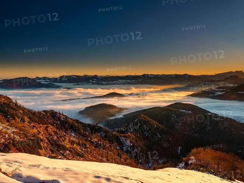 Alpine panorama at sunrise in winter, in the fog valley, Untersberg, Marktschellenberg, Berchtesgadener Land, Upper Bavaria, Bavaria, Germany