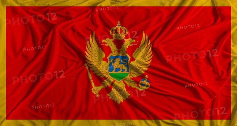 Montenegro flag with fabric texture background. National flag of Montenegro with cloth texture