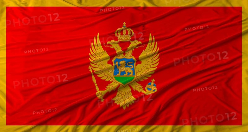 Montenegrin flag waving. Flag of Montenegro with cloth texture