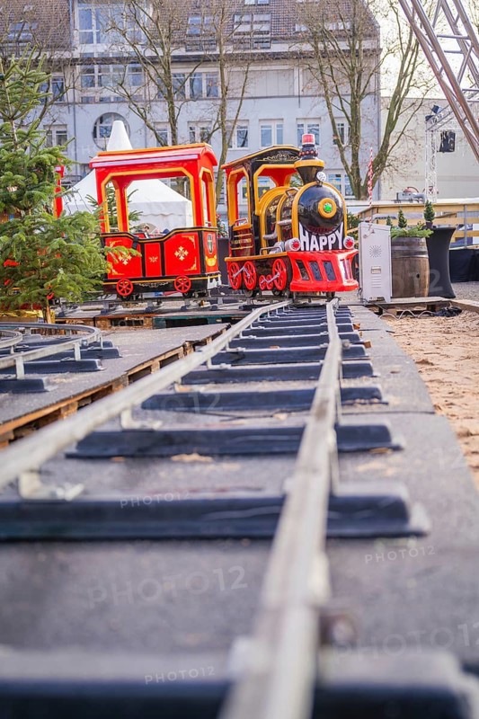 A toy train on rails in a Christmas setting with festive colors, Sindelfingen, Böblingen district, Germany