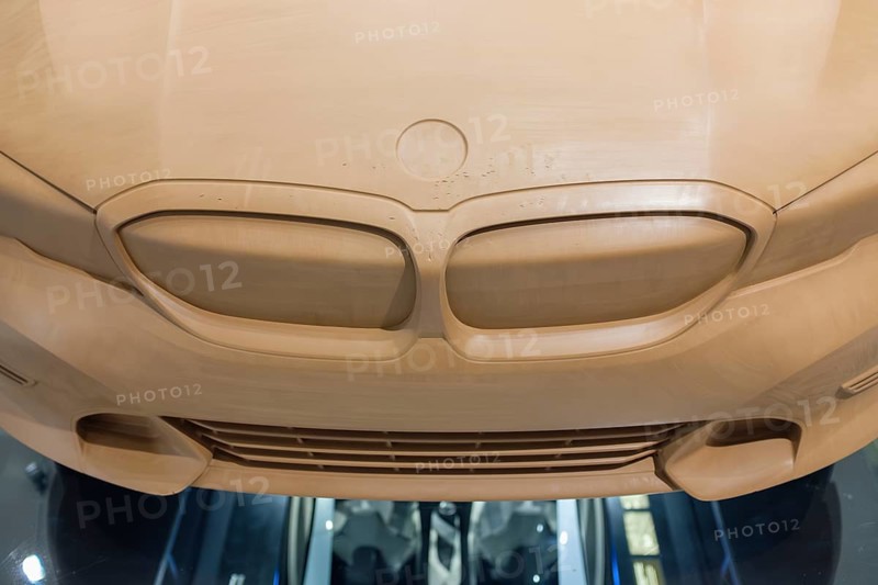 Clay model, clay model of a BMW vehicle used during the design process. These life-size models are an essential part of vehicle development at BMW to evaluate surfaces, lines and proportions in three dimensions, BMW Welt Munich, Bavaria, Germany