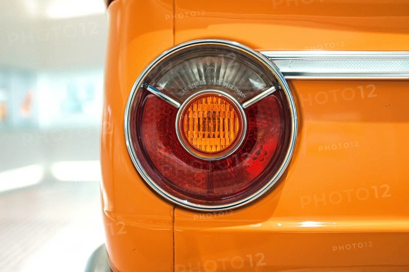 Detailed view, rear light of a BMW 2002 tii, BMW E10 series, also known as BMW 02 series. The round shape was a distinctive design feature of these models, which were manufactured in the 1960s and 1970s, BMW Welt Munich, Bavaria, Germany