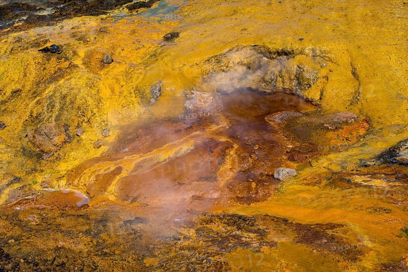 Geological landscape with smoking, mineral-rich surfaces in shades of yellow and orange, geothermal area, rainbow rocks Tuzla, AyvacÄ±k, Ayvacik, Ã‡anakkale, Canakkale, Turkey