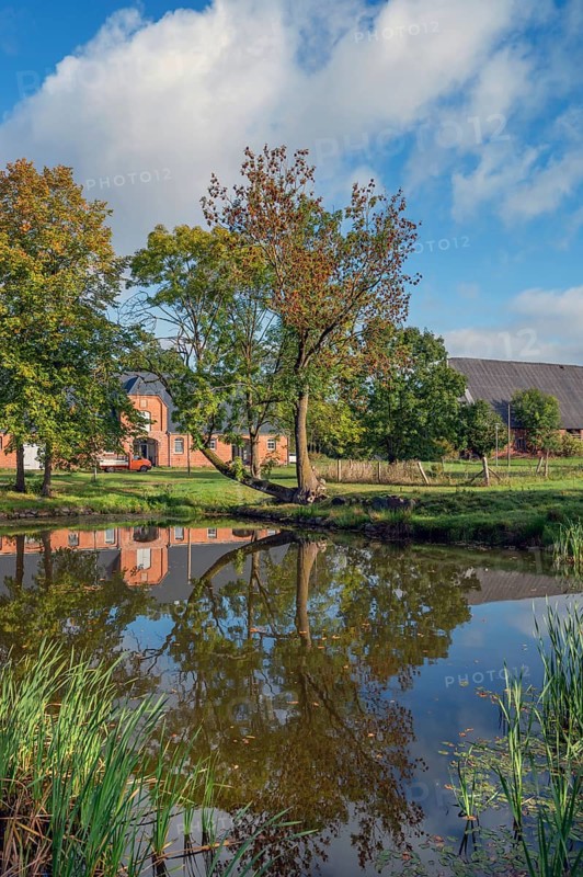 Historic stables with pond at Gut Othenstorf, 1923, Othenstorf, Mecklenburg-Western Pomerania, Germany