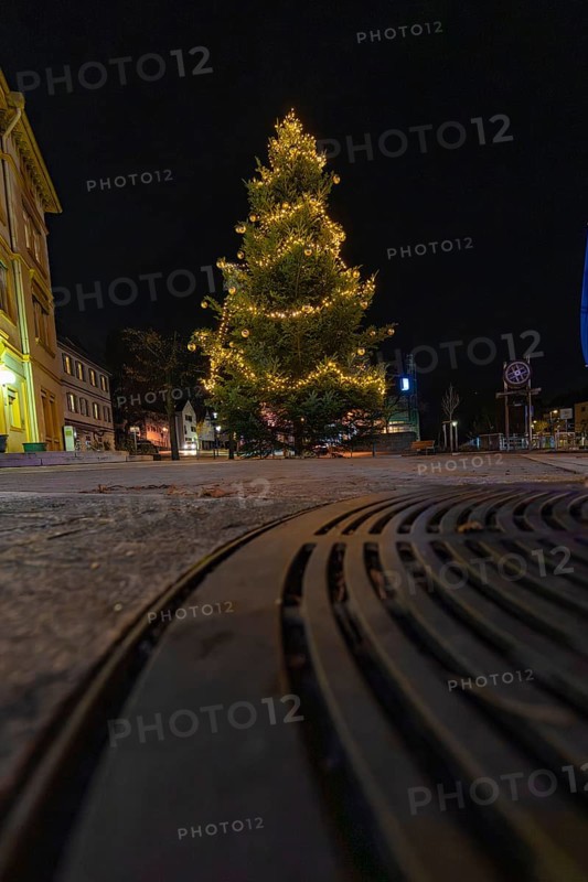 A Christmas tree shot from below with lights at night, Aidlingen, Böblingen district, Germany
