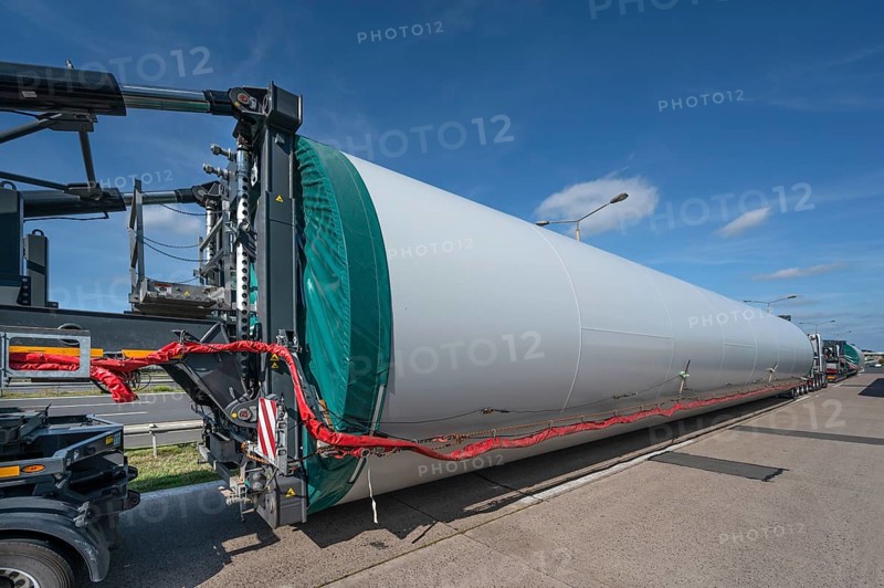 Overlong heavy-duty transporter with a part of a wind turbine, at a motorway rest area of the A9, Mecklenburg-Western Pomerania, Germany