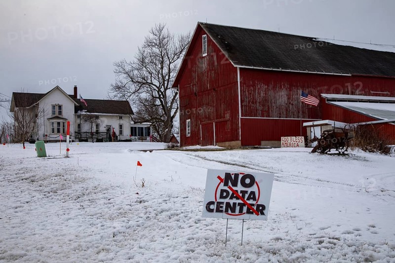 Saline, Michigan USA - 1 December 2025 - A sign on a rural Michigan road opposes a planned $7 billion data center on southeast Michigan farm land. Opponents say the Data Center could raise residential electricity rates and endanger the water supply
