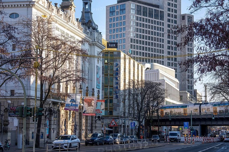 Different types of buildings, houses on KantstraÃŸe in Berlin, Stage Theater des Westens, Motel One Ku'damm, Hochaus des Waldorf Astoria Hotel, S-Bahn Zug, Germany