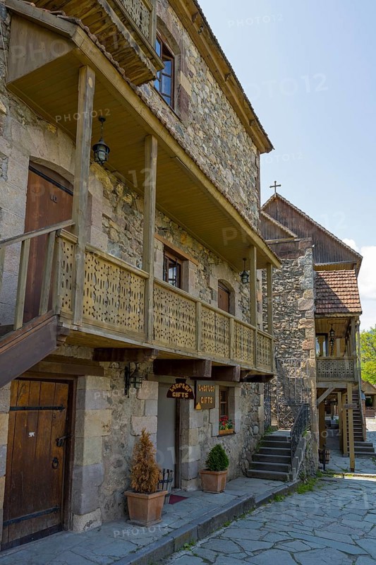 Ancient building with wooden ornaments and outdoor stone steps, Old Town, Sharambeyan Street, Dilijan, Delijan, Delijan, Tavush Province, Armenia