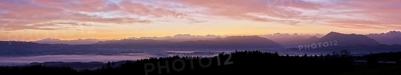 Panorama from Horben with a view of the foggy Reuss Valley, in the background the Alpstein, the Glarner Alps and the Rigi, in the light of dawn, Beinwil-Freiamt, Canton of Aargau, Switzerland