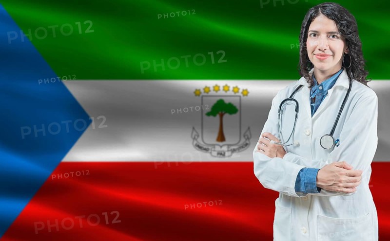 Equatorial Guinean medicine and healthcare concept. Doctor close up against Equatorial Guinea flag background