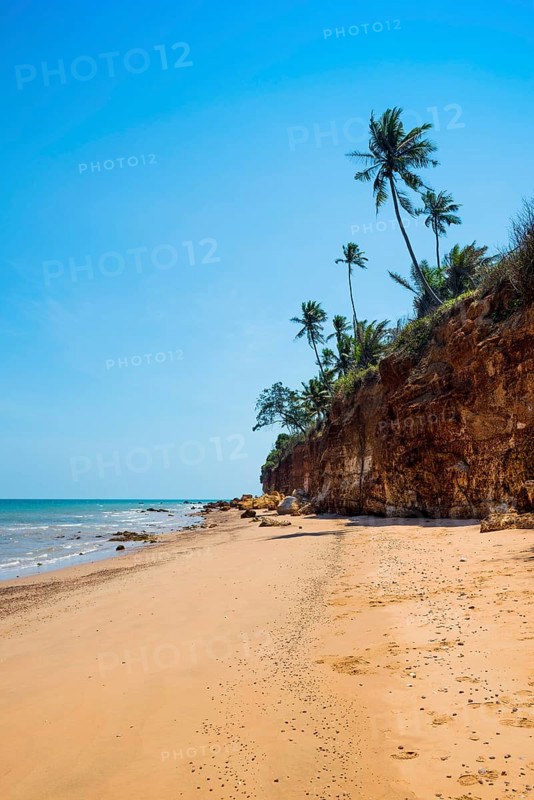 Lonely beach with red rocks and coconut trees, Red Cliffs, Bang Saphan Noi, Prachuap Khiri Khan Province, Central Thailand, Thailand