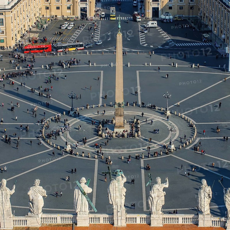 View from above elevated position of ancient Egyptian obelisk on St. Peter's Square in front of St. Peter's Basilica, Vatican, Rome, Lazio, Italy