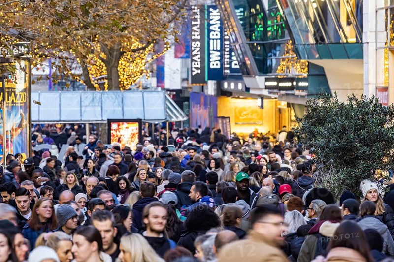 Busy shopping street in Stuttgart. On the first weekend of Advent, visitors flock through the Christmassy decorated KönigstraÃŸe pedestrian zone in Stuttgart. Stuttgart, Baden-WÃ¼rttemberg, Germany