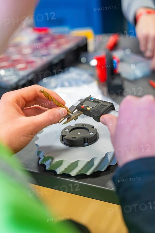 Caliper is used to measure a gear in a technical environment, Jugend Forschungszentrum Nagold, Landkreis Calw, Germany