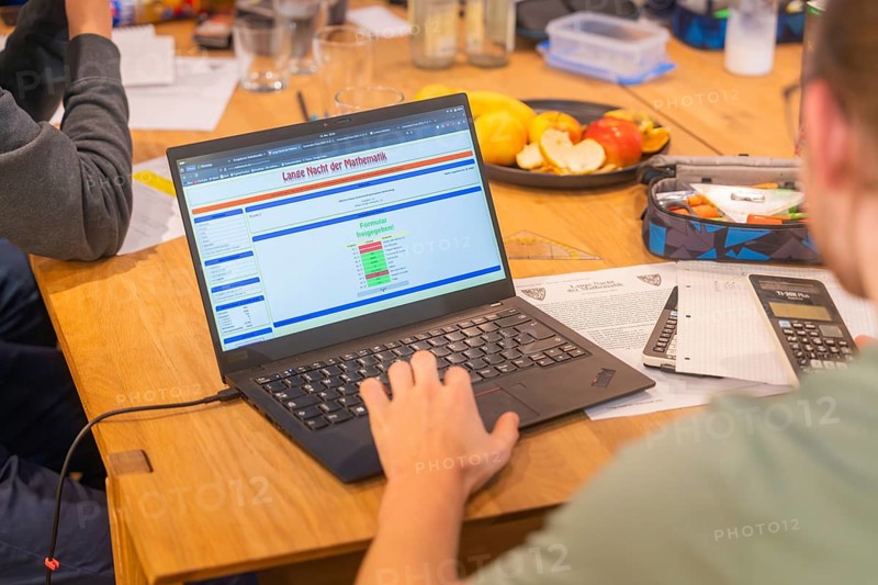 Exercises worked on laptop and writing materials at a table, Jugend Forschungszentrum Nagold, Calw district, Germany