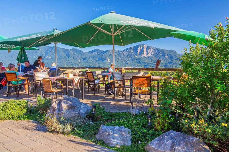 Restaurant terrace from Hofcafe zum Stern in the district of Zell, GroÃŸweil, Loisachtal, Das Blaue Land, Upper Bavaria, Bavaria, Germany