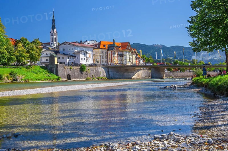 Isar bank with Isar bridge, parish church tower and Marienstift or Krugledererhaus, Bad Tölz. Isartal, Upper Bavaria, Bavaria, Germany