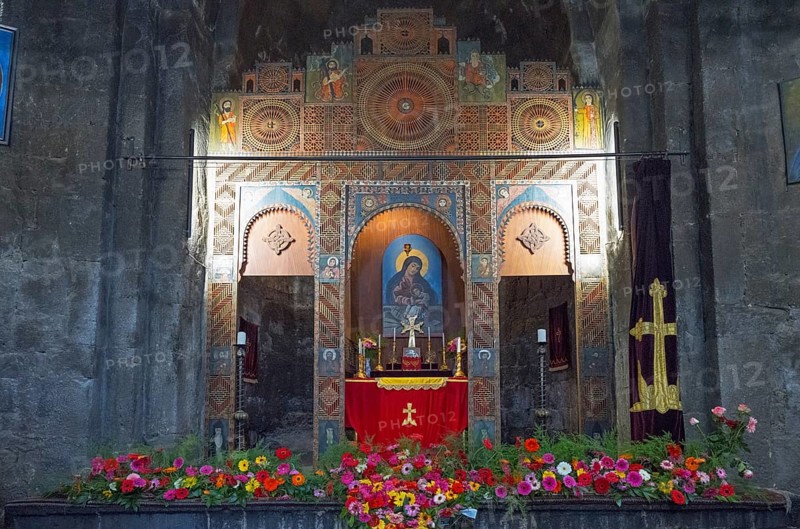 A richly decorated altar in a church surrounded by flowers and icons, Sevanavank Monastery, Gegharkunik Province, Armenia