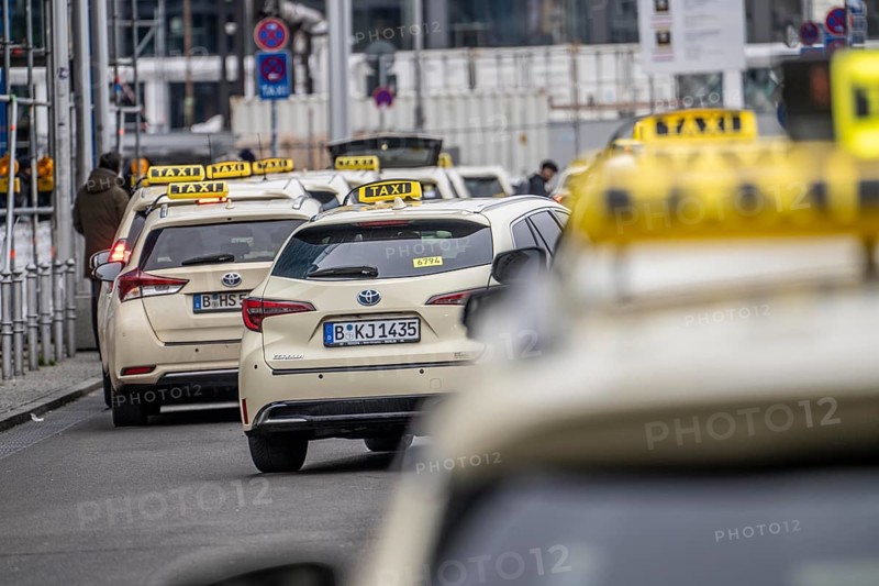 Taxis in front of the main train station in Berlin, waiting in line for passengers, Germany