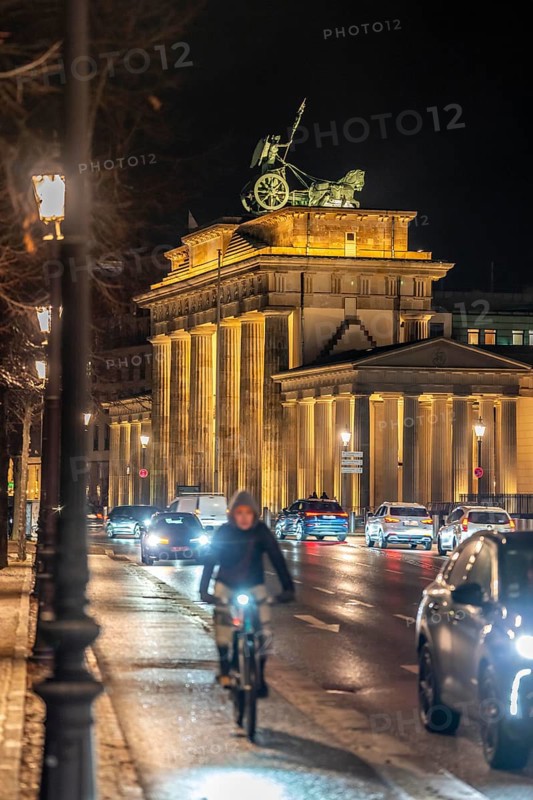 Evening traffic on EbertstraÃŸe, on 18th March Square, Brandenburg Gate, Berlin, Germany