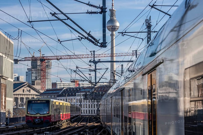 Railway line in Berlin, east of FriedrichstraÃŸe station, looking east, Berlin TV Tower, trains on the line, S-Bahn