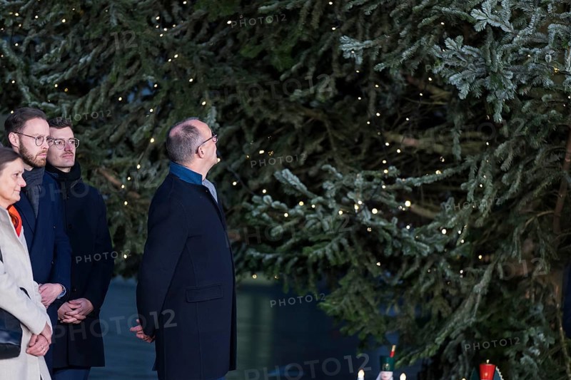 Friedrich Merz (CDU, Federal Chancellor of the Federal Republic of Germany) looks at the 13-metre-high and 45-year-old Ates Nordmann fir tree (Abies nordmanniana) on the BrÃ¼ninghauser Bachtal in Sauerland handing over the Christmas tree to the Federal Chancellery, Berlin, 28.11.2025