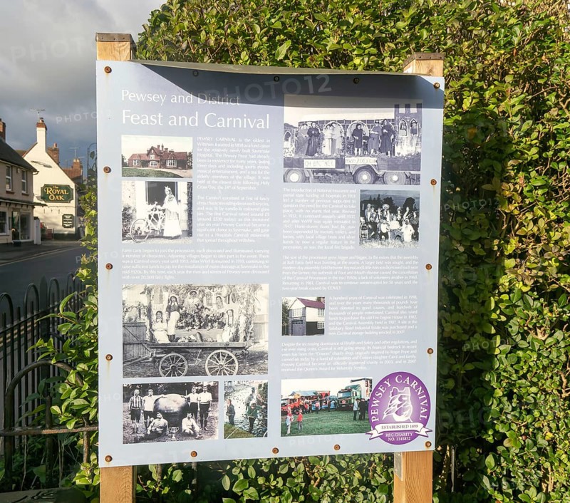 Information board notice about Pewsey and District annual Feast and Carnival, Pewsey, Wiltshire, England, UK