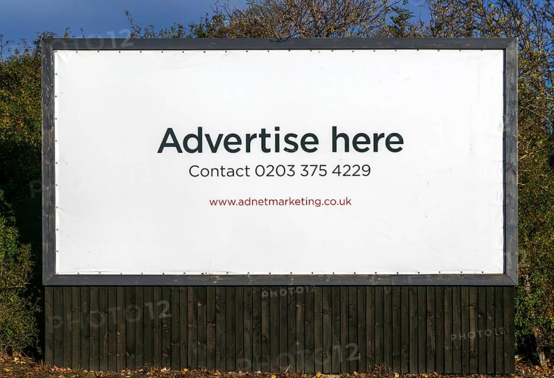 Advertise here message empty billboard sign website contact details and phone number, Adnet outdoor advertising company UK