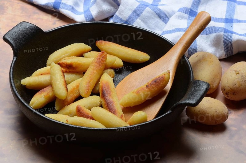 Fried puff noodles in a pan