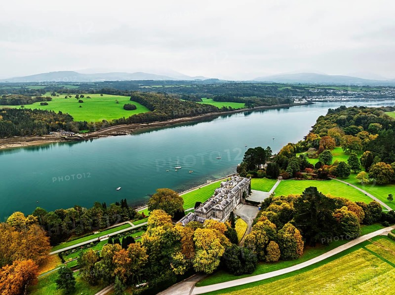 Autumn over Plas Newydd House from a drone, Gardens and Parkland, Llanfairpwllgwyngyll, Anglesey, Wales, UK