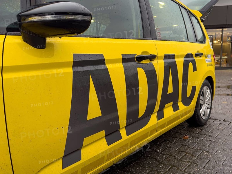 Large ADAC logo on car vehicle for roadside assistance, Germany