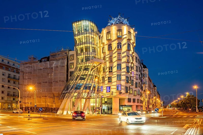 The Dancing House of architects Vlado MiluniÄ‡ and Frank Gehry at dusk, Prague, Czech Republic