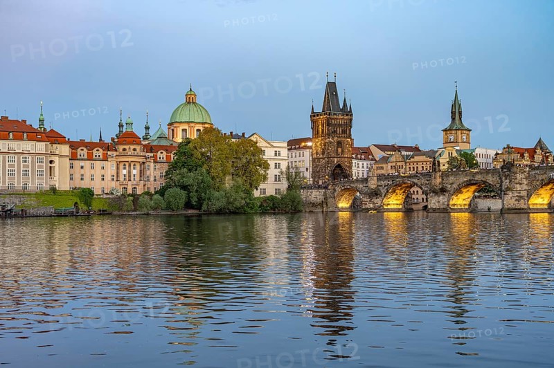 Old Town of Prague with Vltava River, Charles Bridge and Old Town Bridge Tower at dusk, Prague, Czech Republic