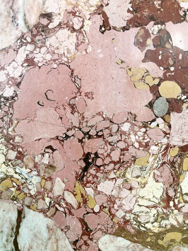 Pink and brown marble surface with natural patterns