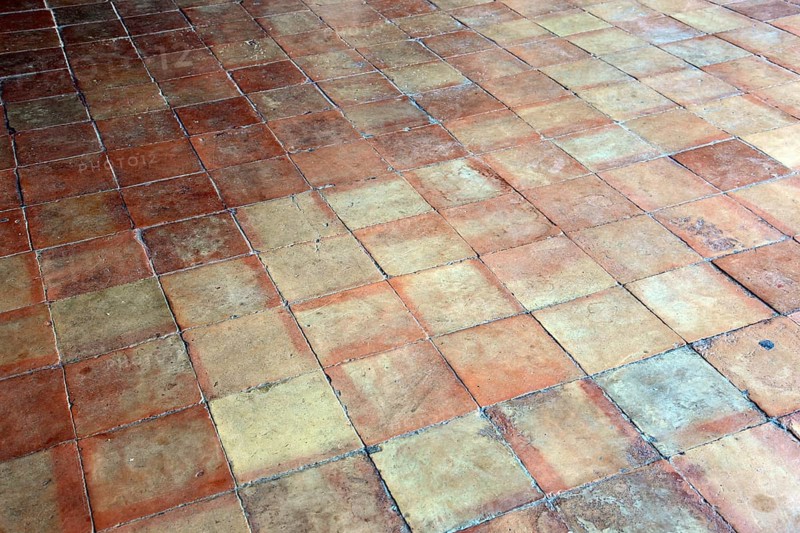 Terracotta tiles with square pattern, earthy and rustic look