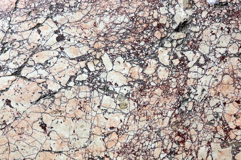 Beige and brown marble with complex pattern and veins