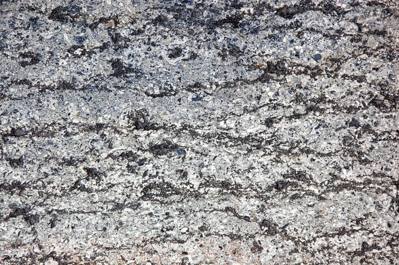 Granite surface with grey and black patterns, showing natural textures