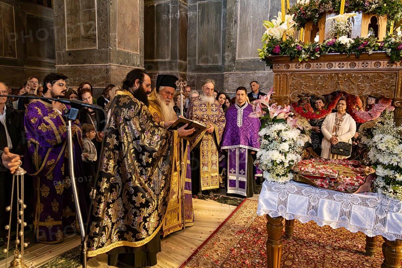 Orthodox priests at Epitaphios at Mass on Good Friday in the Catholicon of the Hosios Luke Monastery, UNESCO World Heritage Site in Steiri, Greece