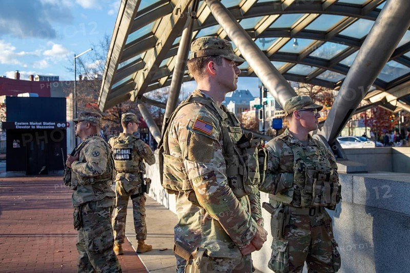 Washington, DC USA - 26 Novemer 2025 - Ohio National Guardsmen protect the Eastern Market Metro station on Capitol Hill shortly after two West Virginia guardsmen were shot near the White House