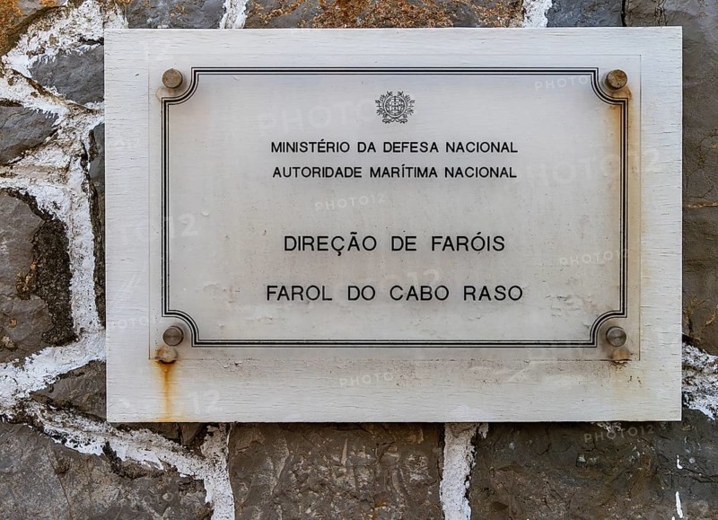 Information sign at the locked entrance to Farol de Cabo Raso lighthouse, SÃ£o Bras de Sanxete fortress, Cascais, Portugal