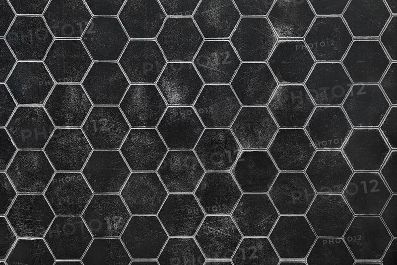A black surface featuring a hexagonal pattern, highlighting a textured look. This design offers a contemporary feel suitable for backgrounds, flooring, or artistic projects