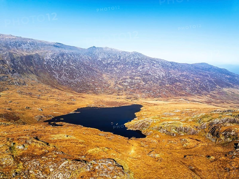 Autumn colours over Llyn Cwmffynnon and Miner's Track, Start Point, road A4086 from a drone, Pen-y-Pass, Snowdonia, Wales, UK