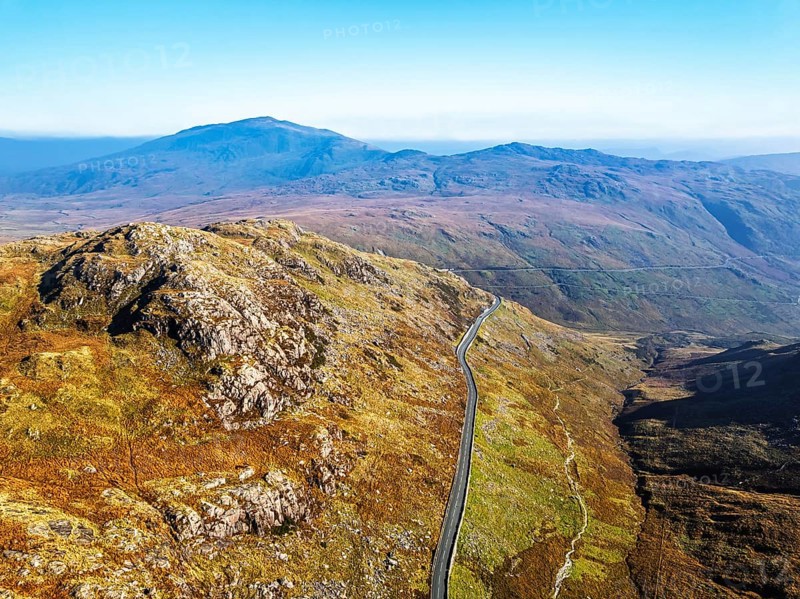 Autumn colours of Pen-y-Pass over Miner's Track, Start Point and road A4086 from a drone, Snowdonia, Wales, UK