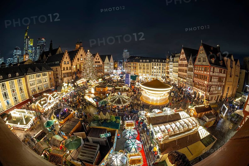 With the lighting on the Mrs. Holle Christmas tree, a 30-meter high Nordmann fir tree, the Frankfurt Christmas Market was officially opened on 24.11.2025. The Christmas market will be open until December 22 from Monday to Saturday from 10:00 to 21:00 and on Sundays from 11:00 to 21:00, Römerberg, Frankfurt am Main, Hesse, Germany