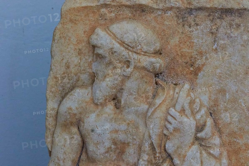 Marble relief depicting standing man, c. 460 BC, ancient stone relief with bearded man in half-sided view, Archaeological Museum, Nemea, Peloponnese, Greece